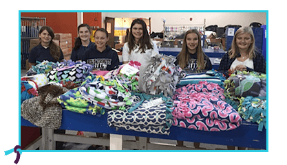 Girl Scout Troop 1010 of Charlotte, NC earned their Silver Award partnering with Words & Warmth.